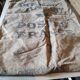 Vintage postal bag trade object of La Poste in mixed-race canvas burlap
