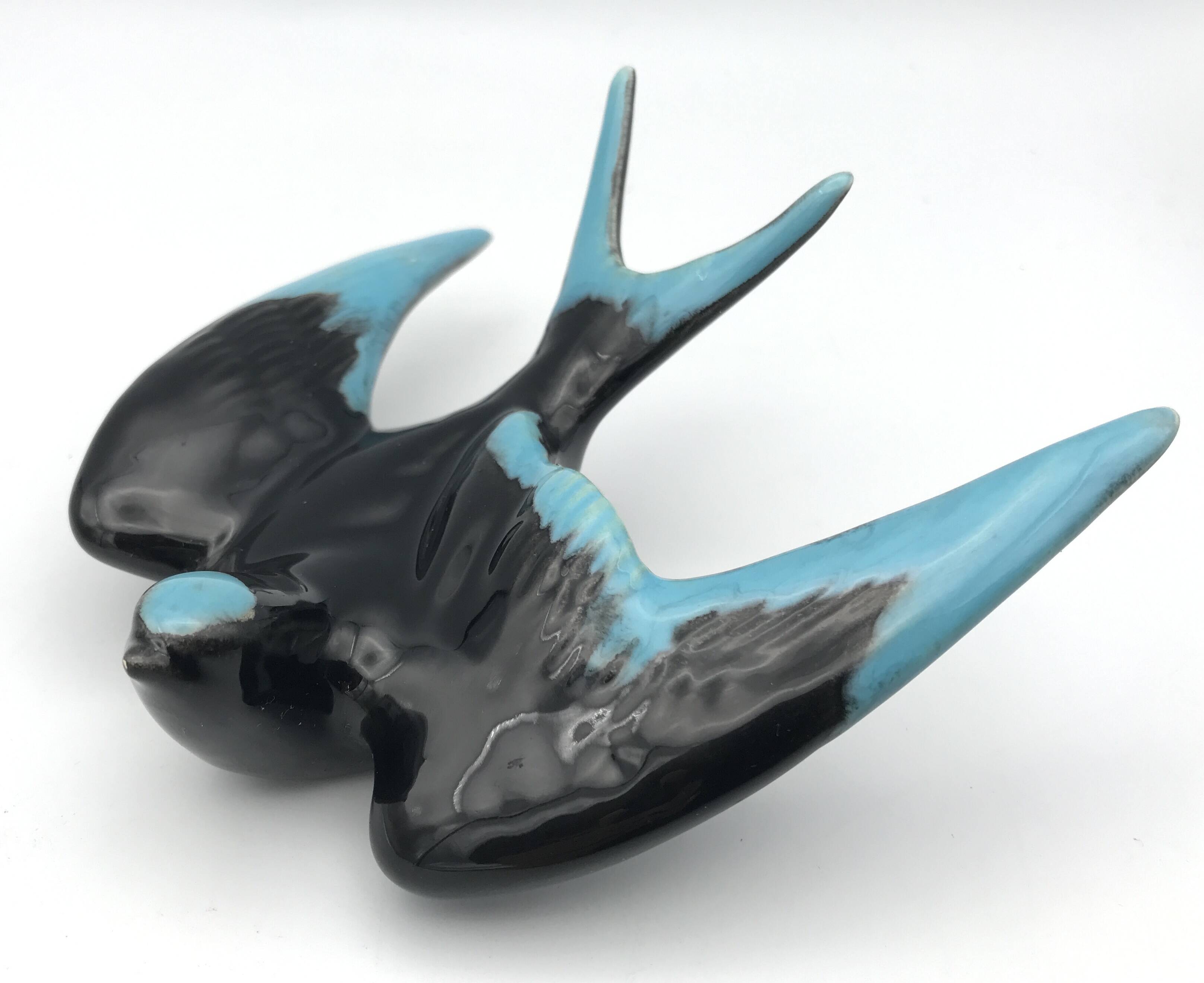 Vintage swallow in two-tone black and blue enameled ceramic
