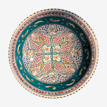 Moroccan dish with terracotta and hand-painted patterns