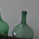 Pair of vintage green glass bottles — Hungarian carboys from the 1960s.