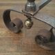 Pair of old cast iron and brass channels