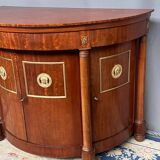 Empire style sideboard. Mahogany. Gilded bronze decoration.