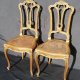 Pair of old canne chairs in gilded wood