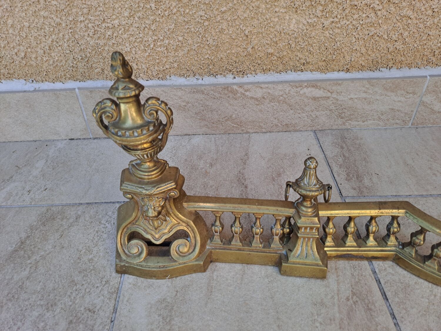 Louis XVI style bronze andirons and fireplace bar