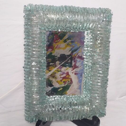 Brutalist mirror in postmodernist glass shard 1980