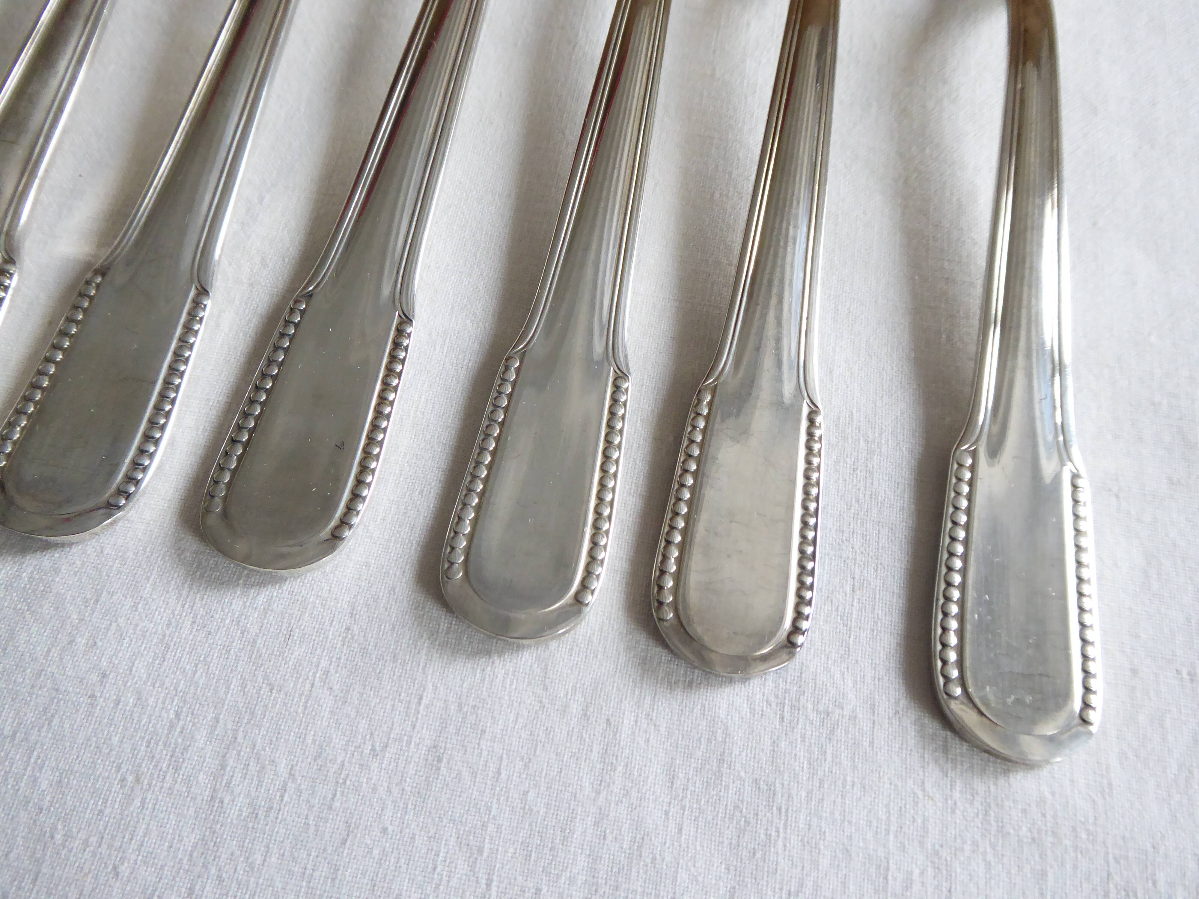 12 dessert forks, silver metal