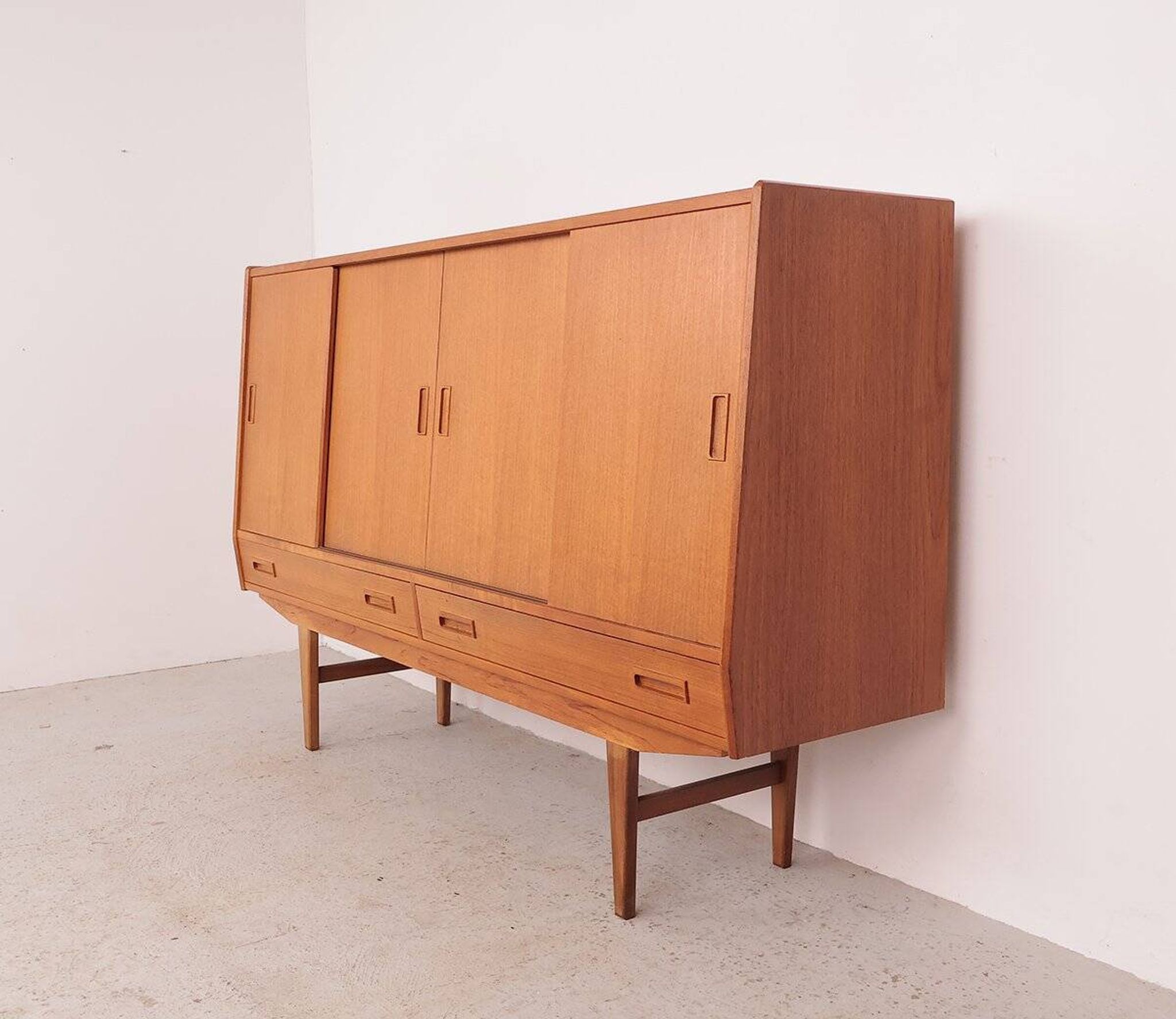 Teak highboard with sliding doors from Westergaard, 1960s