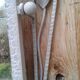 Former Wall coat hangers painted in gray iron