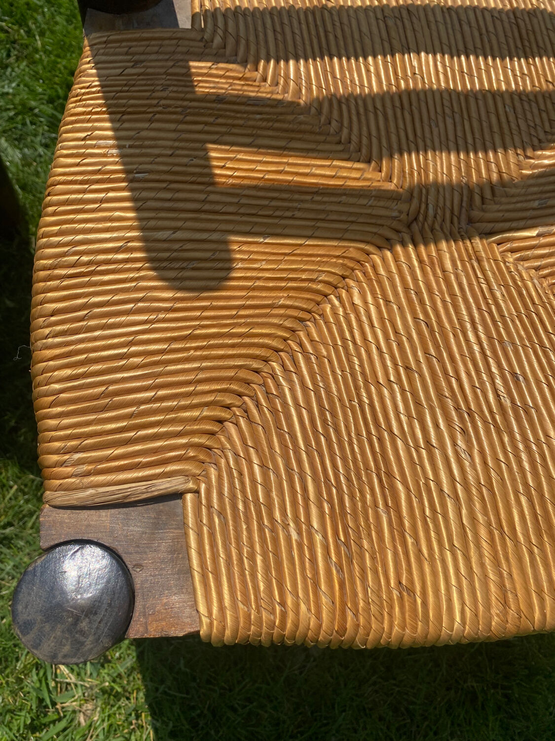 Pair of Georges Robert straw chairs