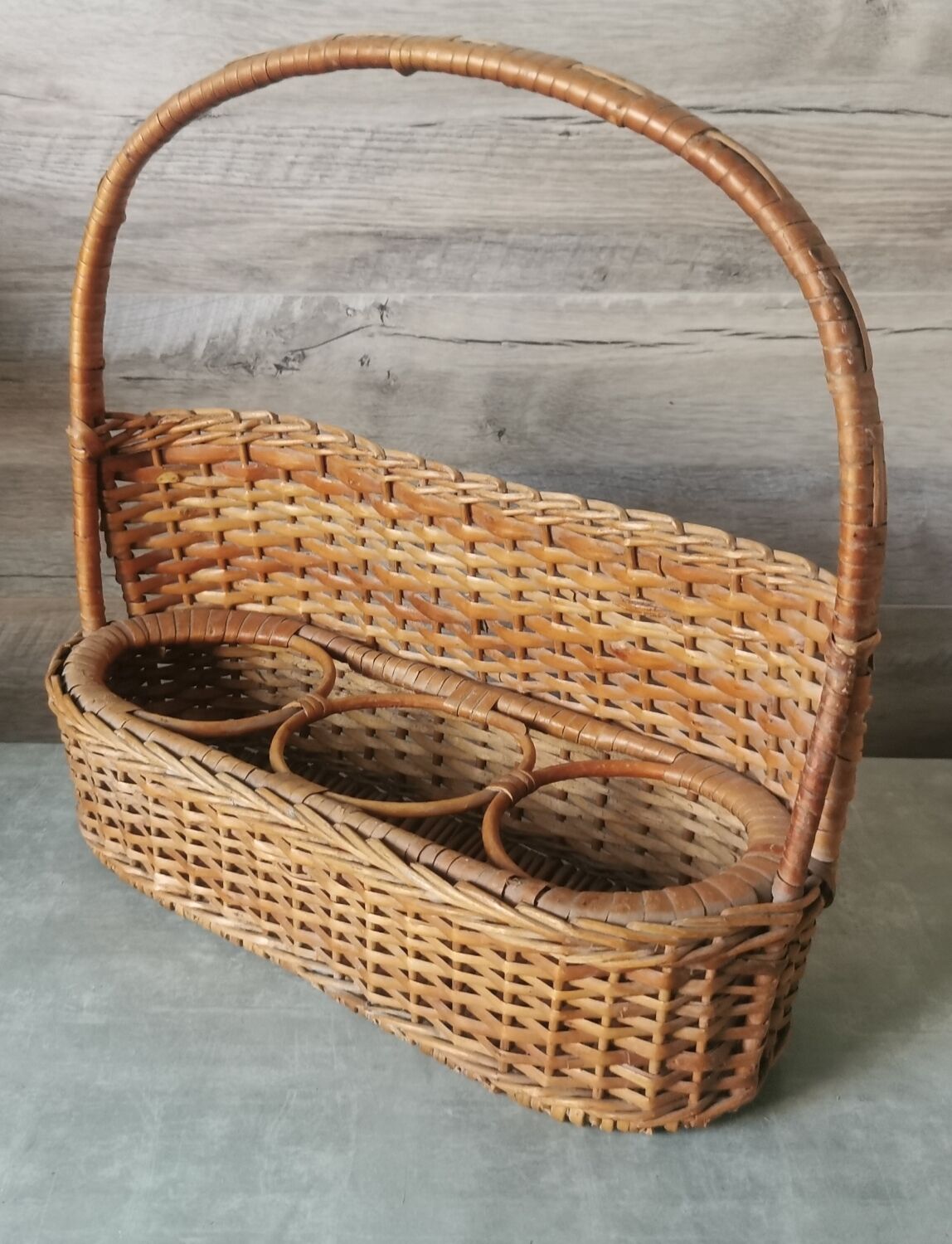 Vintage wicker bottle rack