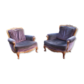 Two voltaire armchairs