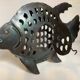 Large metal fish-shaped candle holder