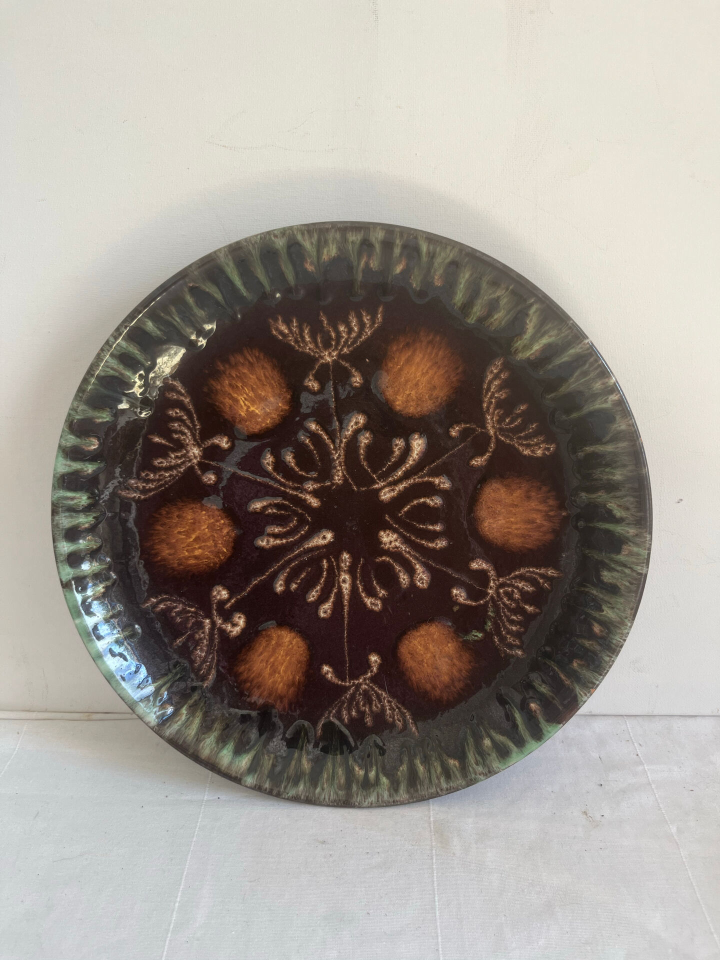 Vintage ceramic bowl for placing or hanging.