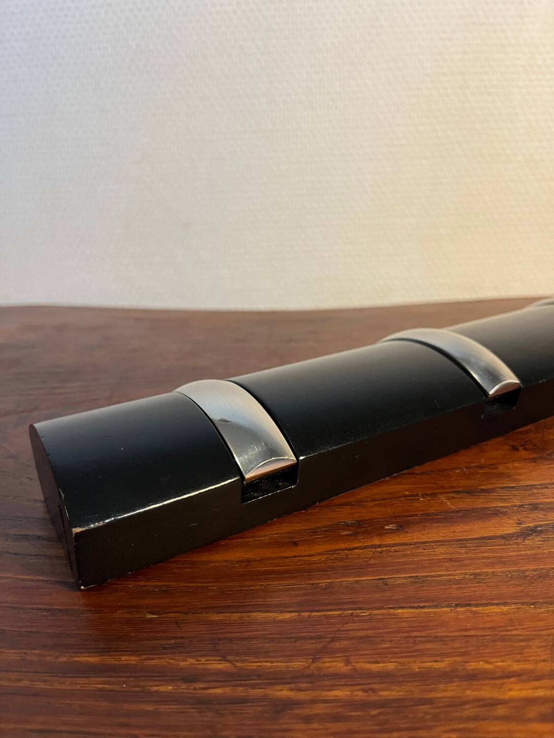 Designer metal and wood wall coat rack