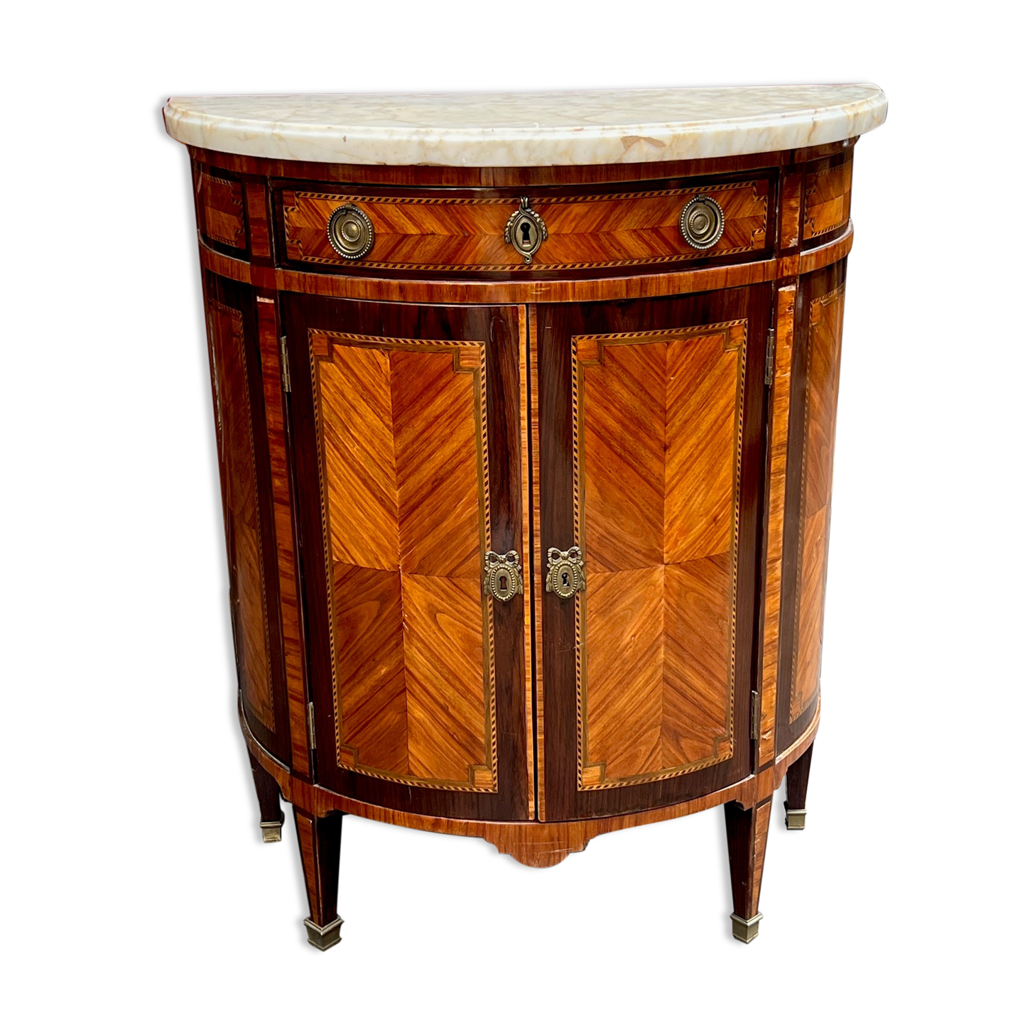 Louis XVI style chest of drawers with marquetry and marble top.