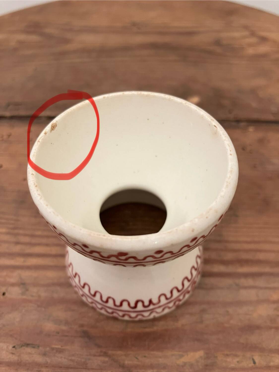 Vintage diabolo-shaped egg cup with burgundy patterns