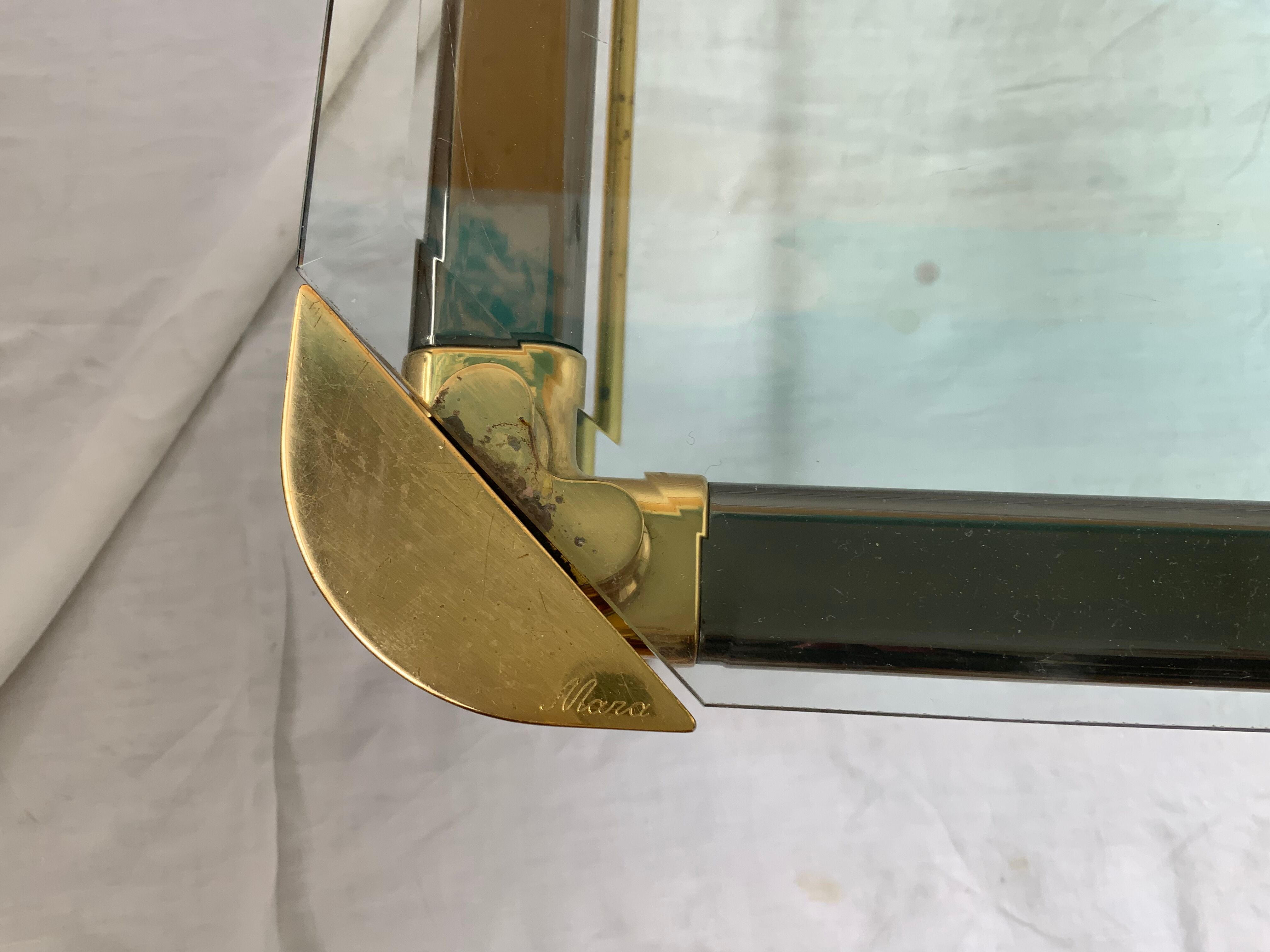 Glass and brass coffee table