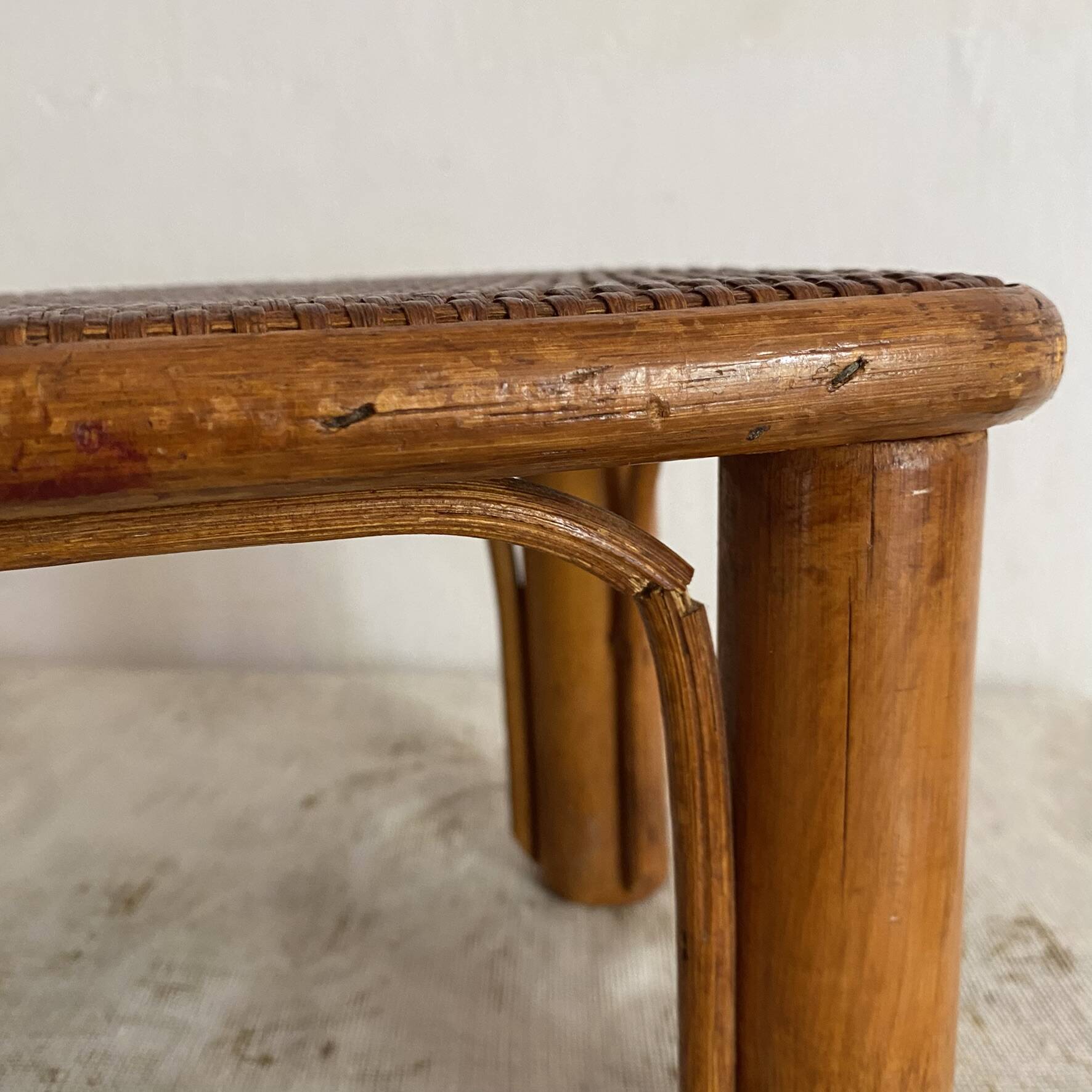 Vintage low rattan stool