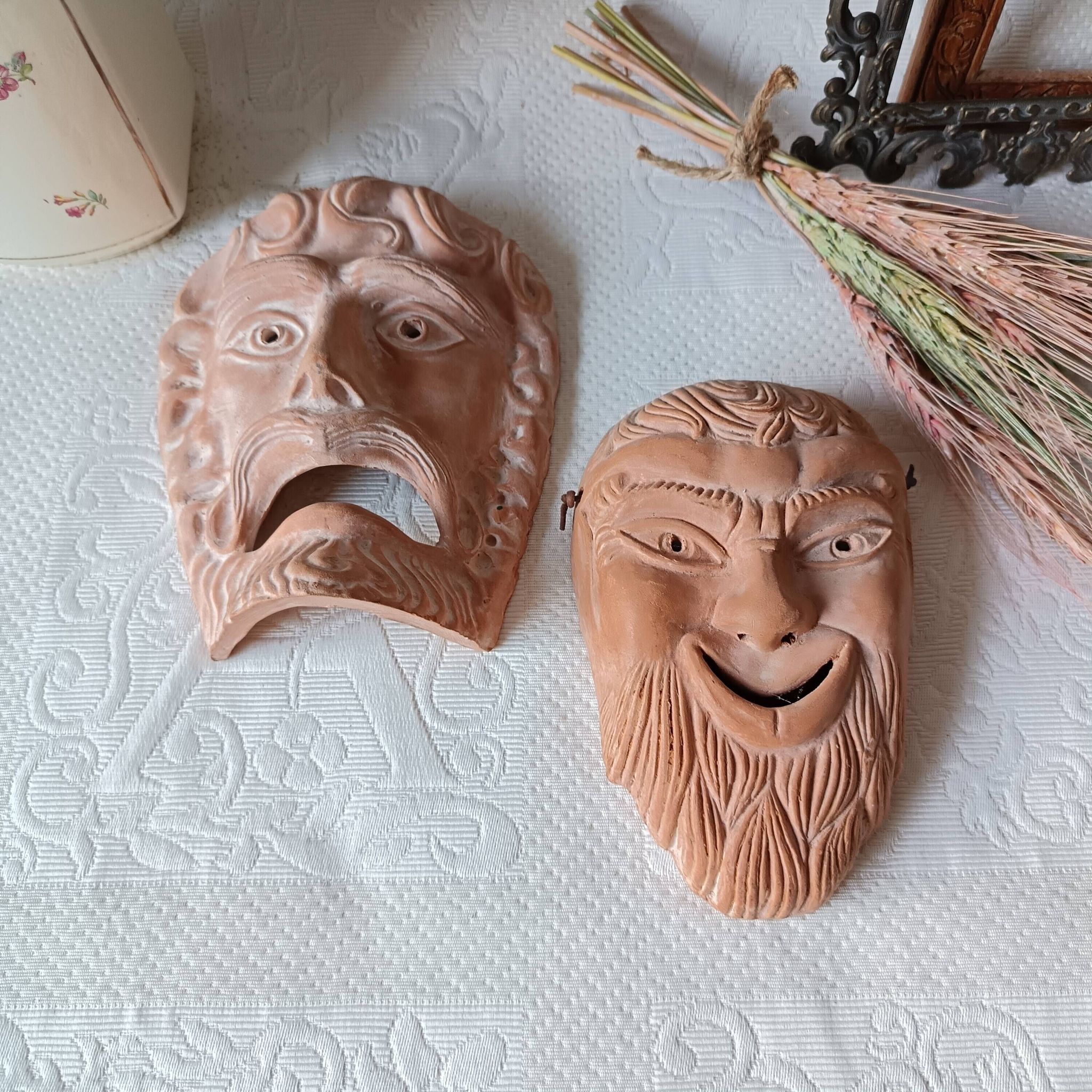 2 vintage terracotta masks made in Greece