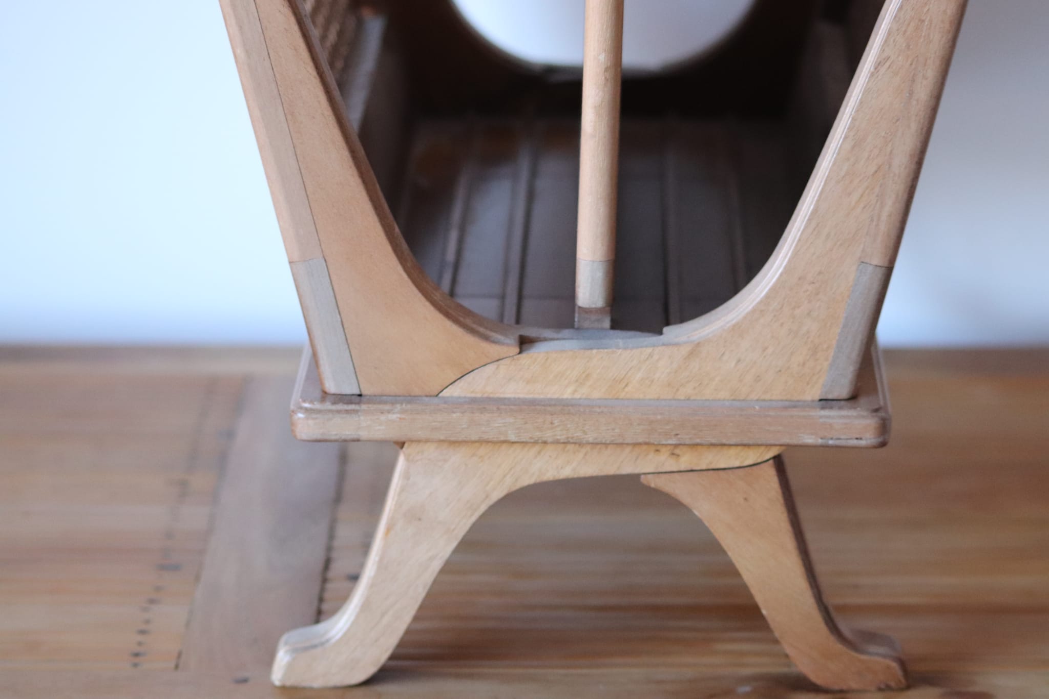 Wooden magazine holder and vintage cannage