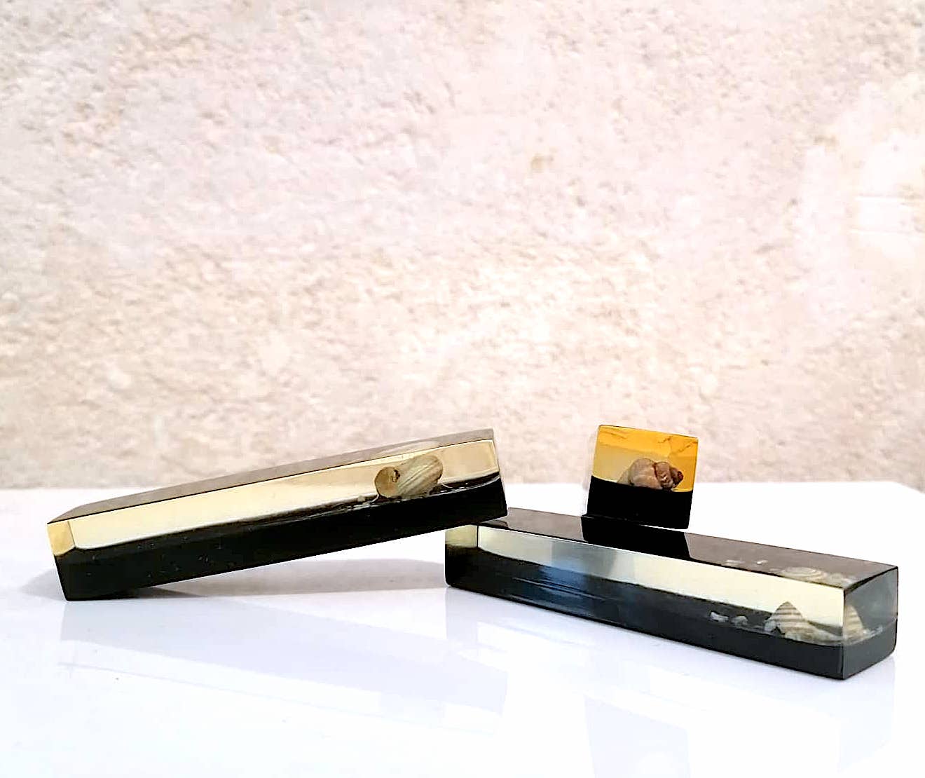 Set of 11 blackened resin knife holders, 1970s
