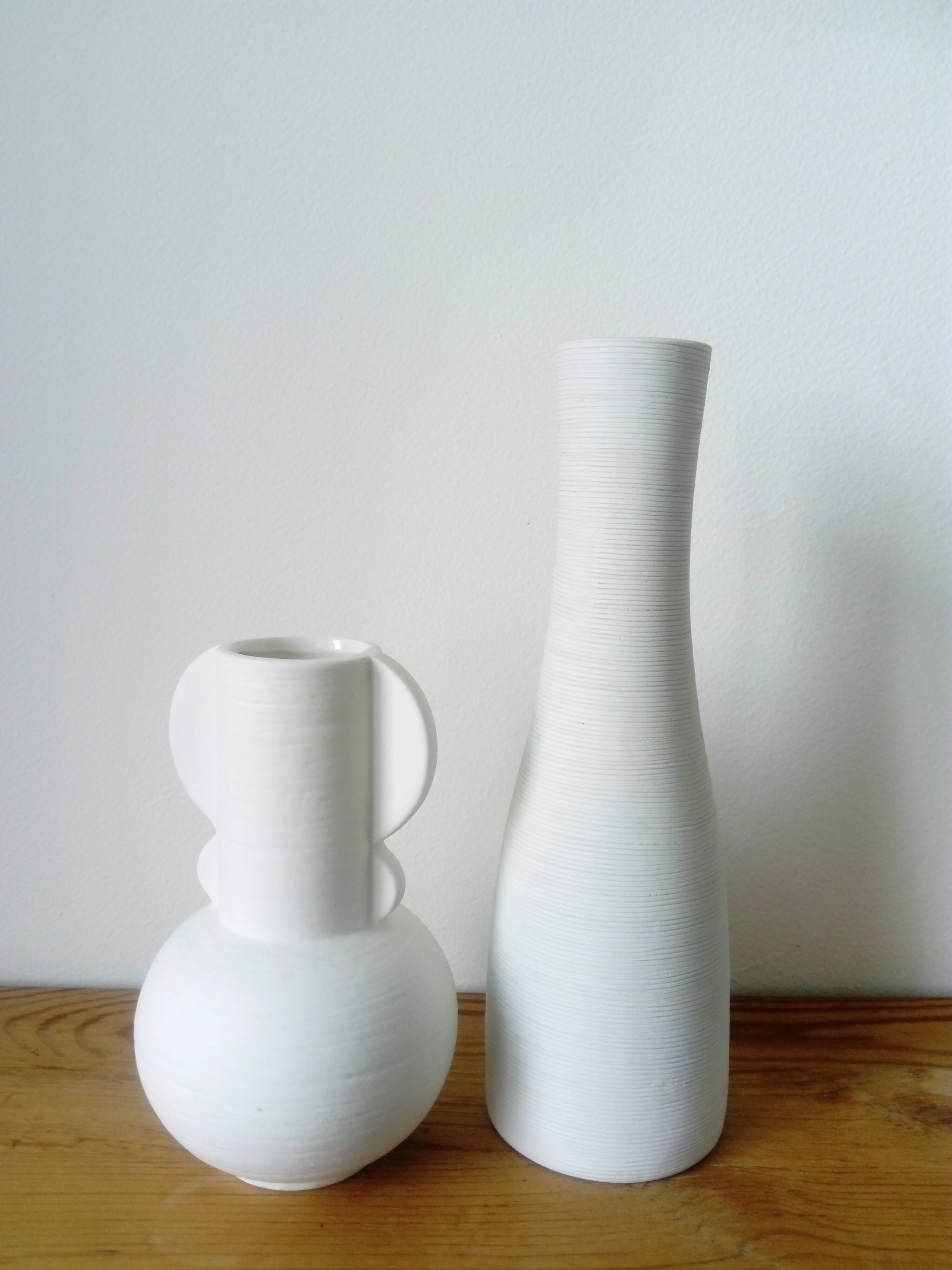 White ceramic vase with fine streaks