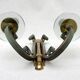 Pair of art deco lacquered metal, brass and glass wall lights