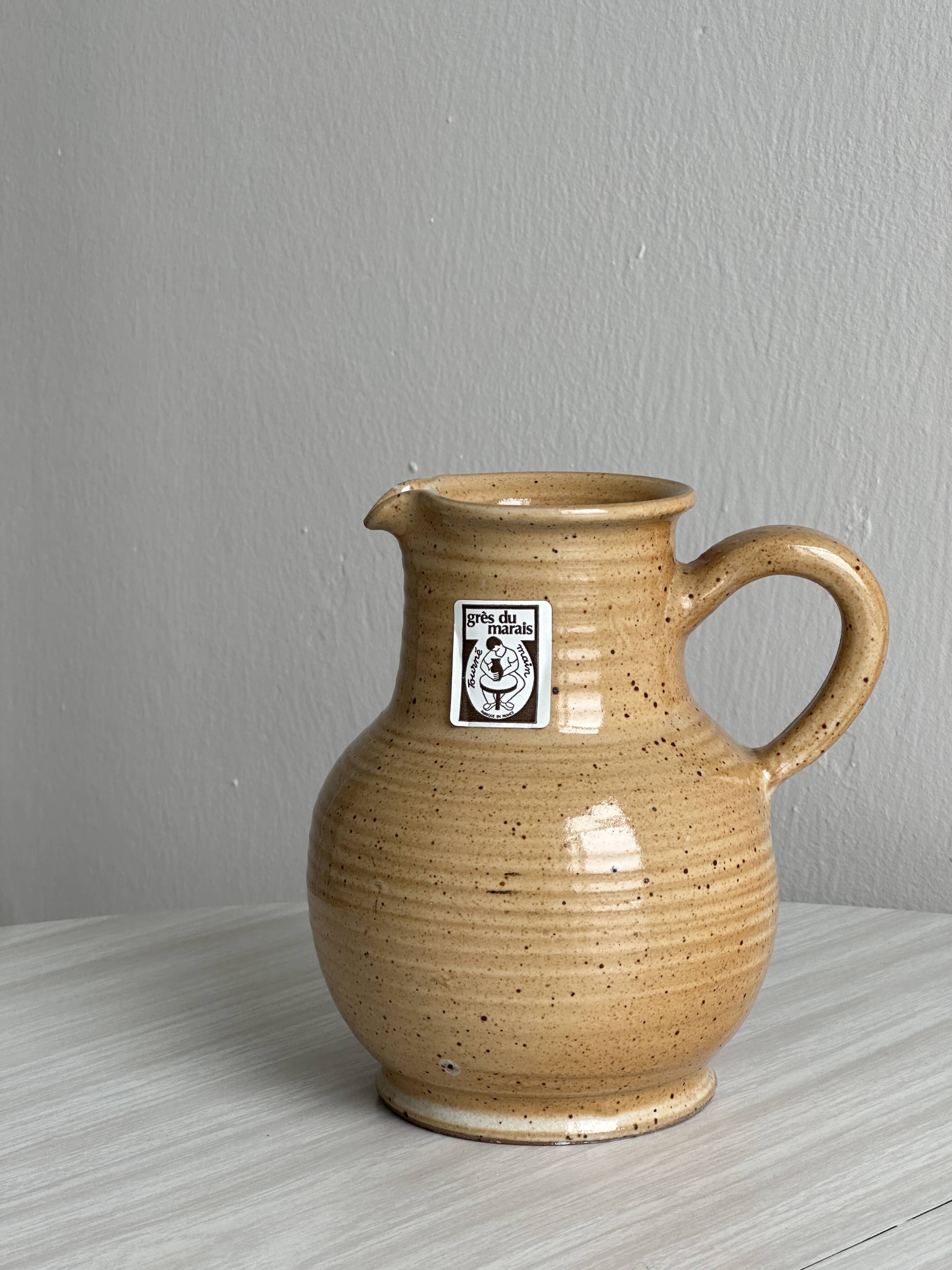 Hand-thrown ceramic pitcher