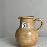 Hand-thrown ceramic pitcher