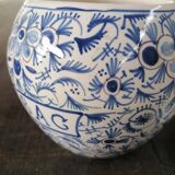 White ceramic pot marked "tobacco"