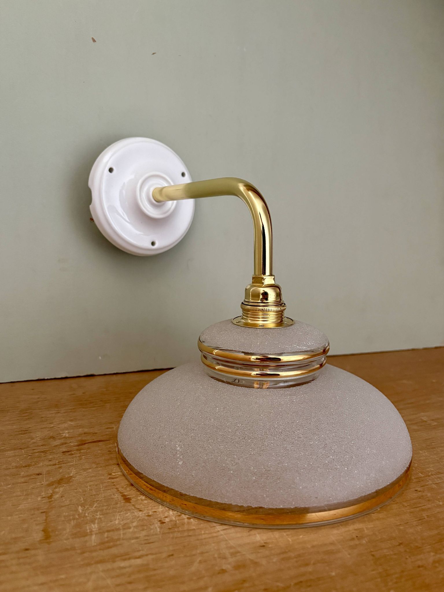 Vintage elbow wall lamp with white and gold granite glass shade