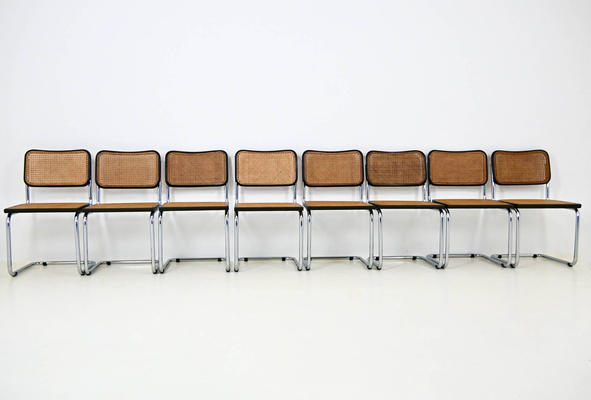 Set of 8 B32 model dining chairs by Marcel Breuer.