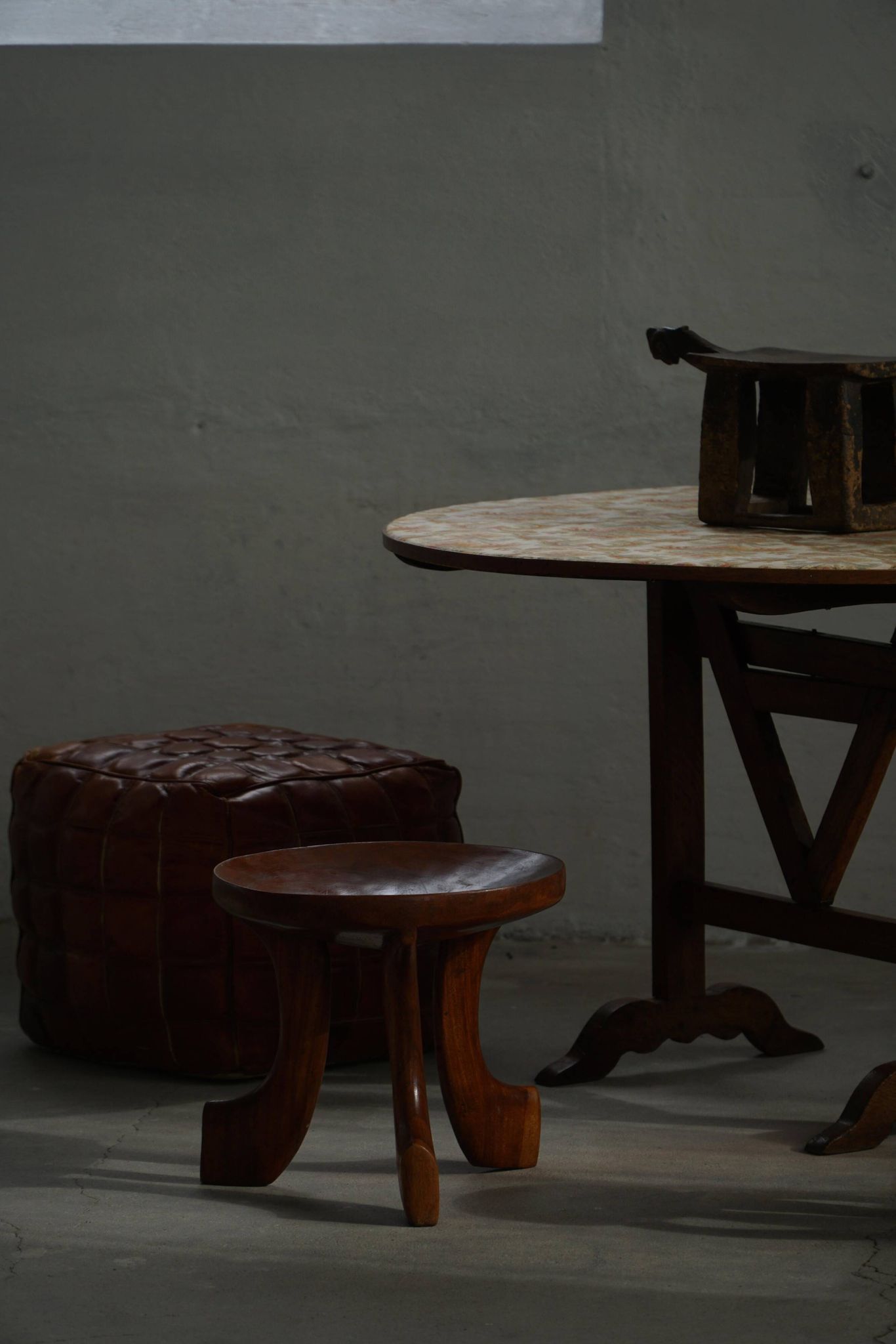 Oromo stool from mid-20th century Africa, hand-carved wood, tribal style.