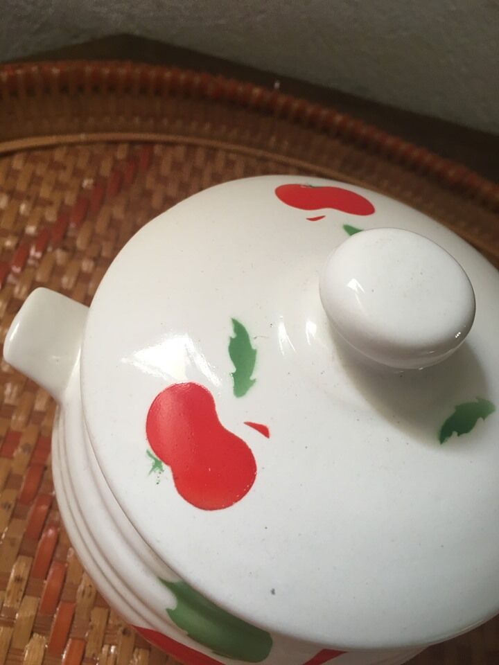 Vintage pot in faience with apple decoration