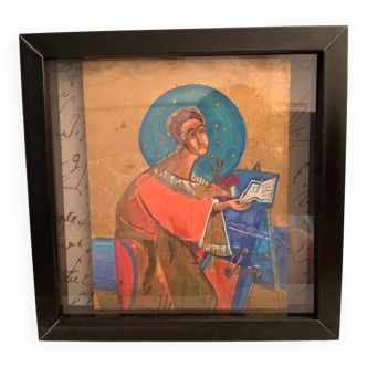 Vintage icon painted on wood in black frame