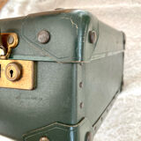 Dark green vintage cardboard suitcase