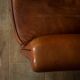 Chaise club en cuir de mouton
