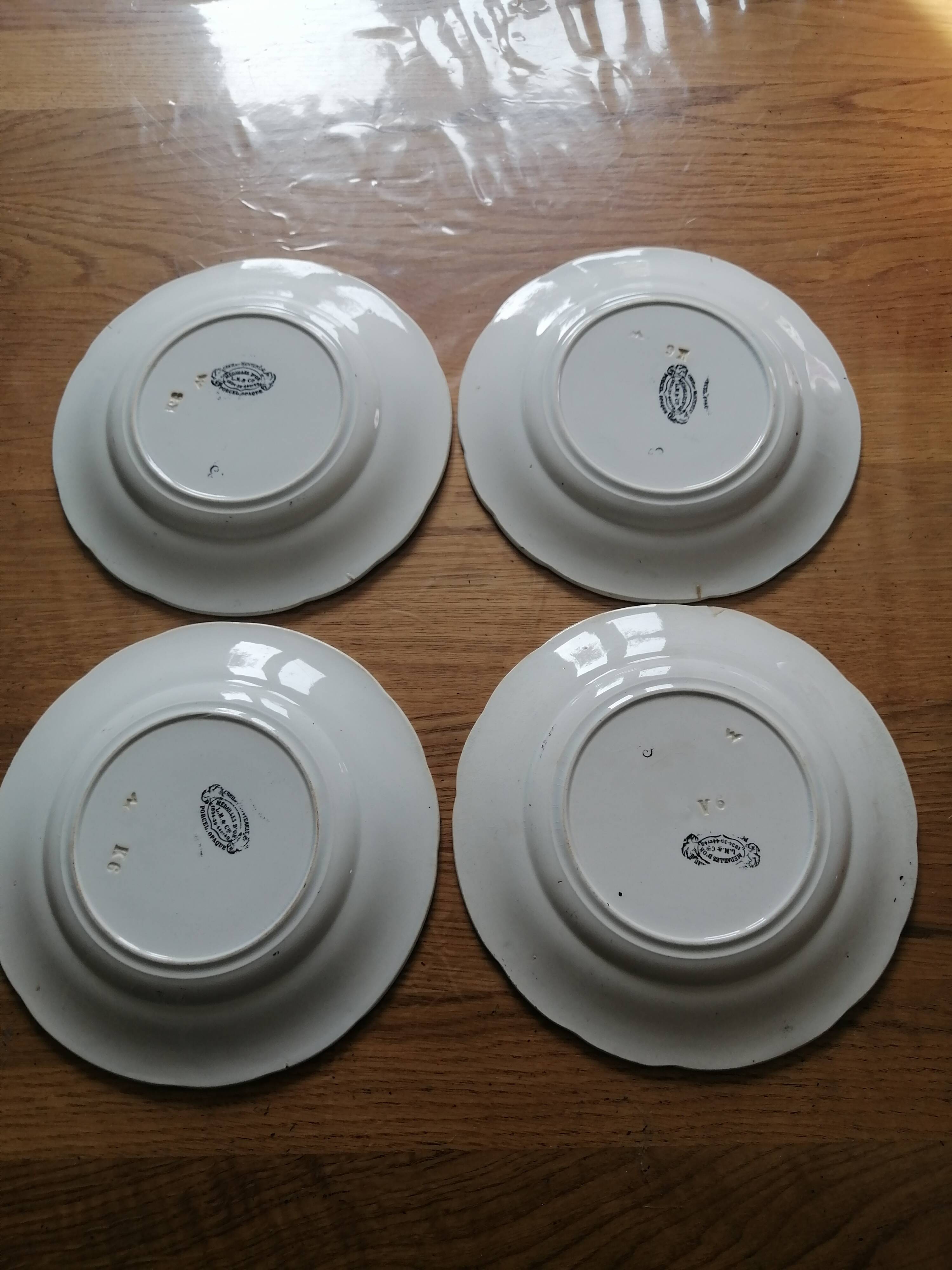 Set of eight talking plates