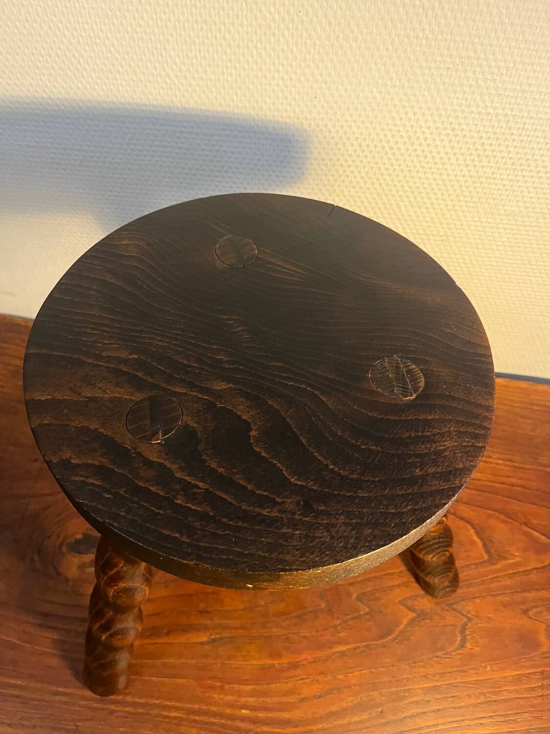 Round tripod stool with turned wooden legs