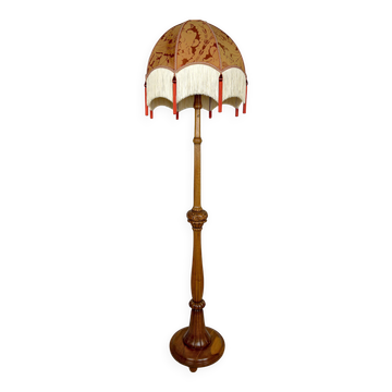 Important Art Deco carved oak floor lamp, France, circa 1920