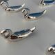8 vintage silver-plated swan knife rests