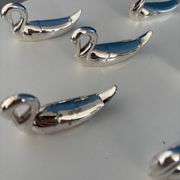 8 vintage silver-plated swan knife rests