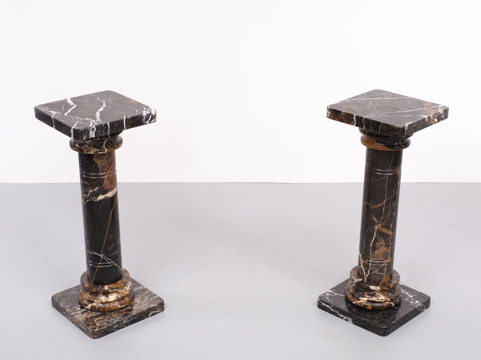 Two black portoro marble pedestals, Italy
