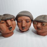 Set of 3 decorative women's heads in red terracotta