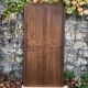 Miroir oval biseauté sur porte art déco Acajou 79x162