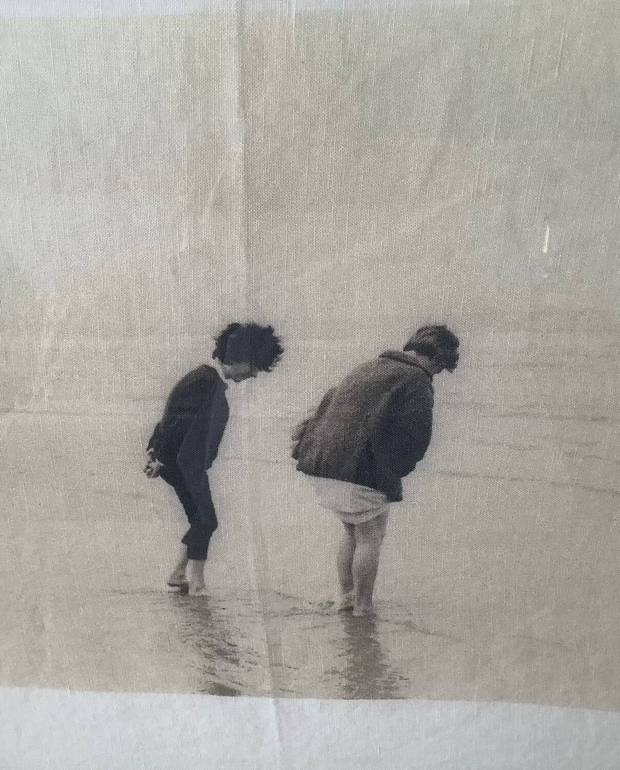 Black and white photo on fabric, framed