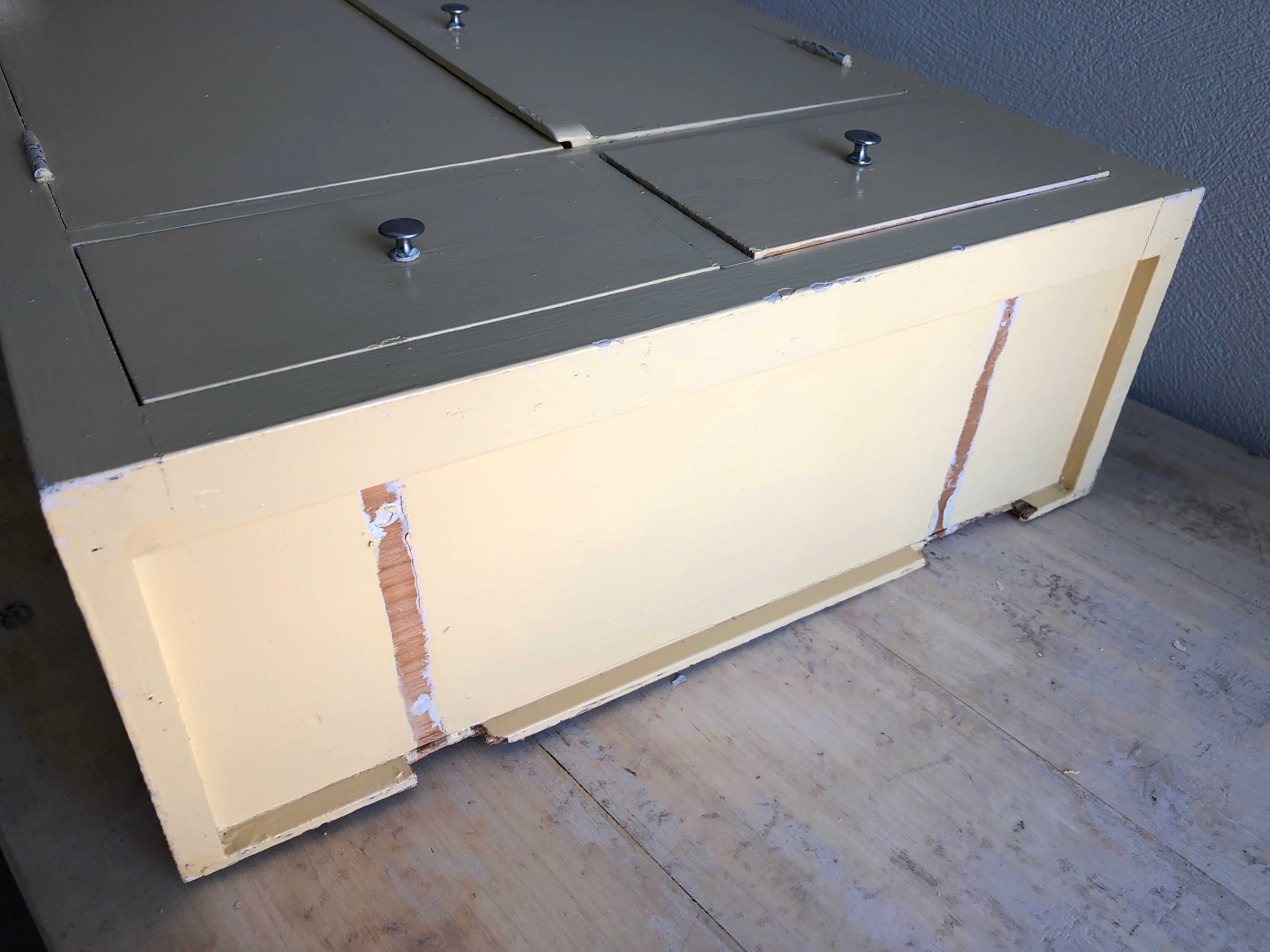 Weathered toilet cabinet