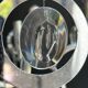 Chrome Metal Design with Swirls and Optical Glass Lenses. Tra
