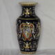 Gien earthenware vase on XX century blue background