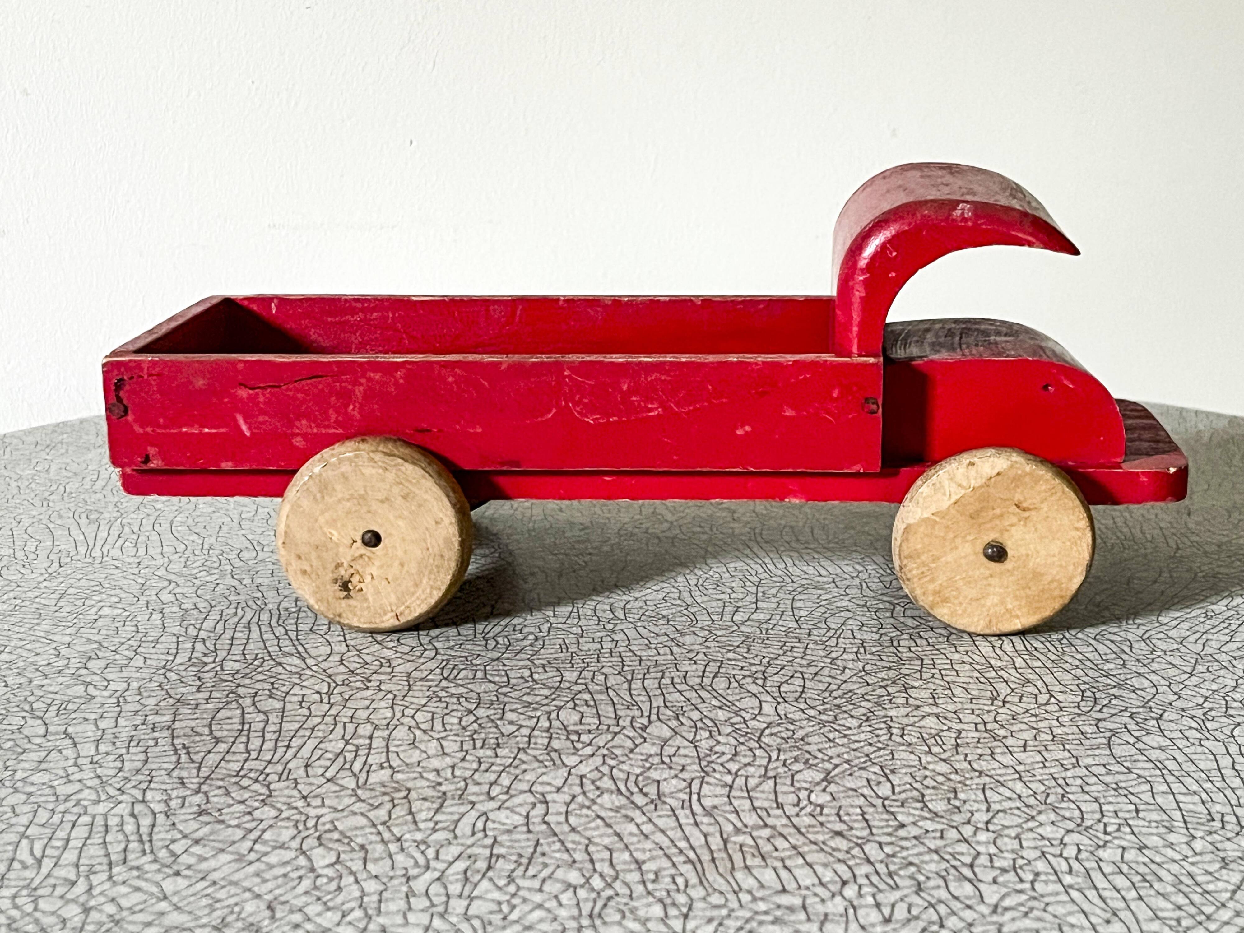 Red wooden flatbed truck, vintage toy